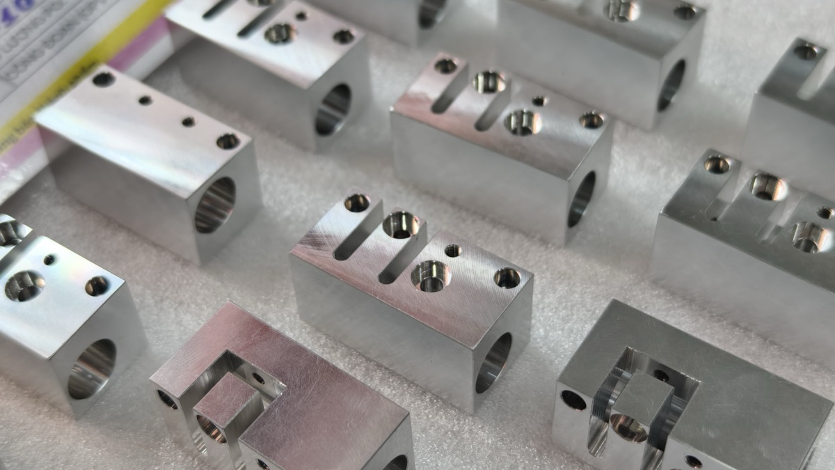 Al 6061 cross-bored manifold blocks 3-axis drilling